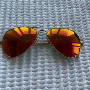 Ray-Ban sunglasses red lens gold frame.  Polarized. Aviators